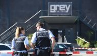 Police stand in front of the disco Club Grey in the southern German town of Konstanz, where a gunman opened fire, killing one and wounding four people before being shot by police, on July 30, 2017. ( AFP / dpa / Felix K?stle)