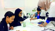 Young girls learning painting at a workshop being held at Girls Creativity Center. Pic: Amna Pervaiz Rao / The Peninsula