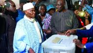 Former Senegal’s president and candidate for the legislative elections Abdoulaye Wade prepares to cast his ballot in Dakar, yesterday.