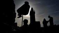REPRESENTATIVE IMAGE: A couple look on the Street performers (AFP / Michal Cizek) 