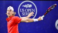 Denis Shapovalov of Canada hits a return against Rafael Nadal of Spain during the Rogers Cup in Montreal on Thursday. The 18-year-old beat top seed Nadal 3-6, 6-4, 7-6(4). 