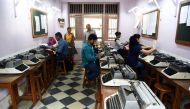 In this photograph taken on July 13, 2017, students practise at Abhyankar's Shorthand & Typewriting Institute in Mumbai. AFP / Indranil Mukherjee