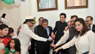 The Ambassador along with other officials cutting a cake during the event. Pic: Baher Amin / The Peninsula