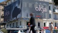A poster for the Netflix movie Okja in competition at the Cannes Film Festival is displayed on the Croisette (REUTERS / Stephane Mahe) 