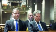 President of Finland Sauli Niinisto and Finland's Minister of Finance Petteri Orpo (L) attend a prayer service at the Turku Cathedral for the victims of Friday's stabbings in Turku, Finland where several people were stabbed on August 18, 2017. AFP / Lehti