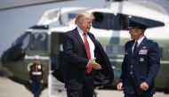 U.S. President Donald Trump is escorted prior to departing for Arizona from Joint Base Andrews, Maryland, U.S., August 22, 2017. Reuters/Joshua Roberts