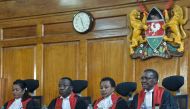 Kenyan Supreme Court judges rule over an opposition petition challenging the result of the August 8 presidential election in Nairobi on September 1, 2017. Kenya's Supreme Court declared the results of last month's presidential poll 