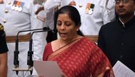 India's ruling Bharatiya Janata Party (BJP) politician and member of parliament Nirmala Sitharaman takes the oath during the swearing-in ceremony of new ministers at the Presidential Palace in New Delhi, India, September 3, 2017. (REUTERS/ Prakash Singh)