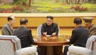 This picture taken on September 3, 2017 and released by North Korea's official Korean Central News Agency (KCNA) on September 4, 2017 shows North Korean leader Kim Jong-Un (C) attending a meeting with a committee of the Workers' Party of Korea about the t