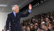 FILE PHOTO: Designer Ralph Lauren greets the crowd after presenting his Spring Summer 2016 collection during New York Fashion Week in New York, September 17, 2015 (REUTERS / Lucas Jackson) 