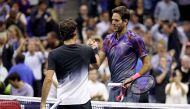 Juan Martin del Potro (R) of Argentina shakes hands with Roger Federer (L) of Switzerland after their Men's Singles Quarterfinal match on Day Ten of the 2017 US Open at the USTA Billie Jean King National Tennis Center on September 6, 2017 in the Flushing 