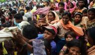 NEEDING AID. Newly arrived Rohingya refugees scuffle for relief supplies at Kutupalong refugee camp in the Bangladeshi locality of Ukhia on September 9, 2017. Munir Uz Zaman/AFP.
