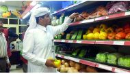 An official from the Municipality conducting an inspection at a shop.