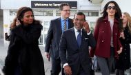 (FILES) In this photograph taken on January 21, 2016, former Maldives president Mohamed Nasheed (C), his wife Laila Ali (L) and British lawyer Amal Clooney look on after Nasheed arrived at Heathrow airport in London.   AFP / NIKLAS HALLE'N