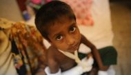 A wounded Rohingya Muslim child, fled from ongoing military operations in Myanmar’s Rakhine state, sits on a stretcher at Cox's Bazar Government General Hospital in Cox's Bazar, Bangladesh on September 13, 2017. (Zakir Hossain Chowdhury/Anadolu Agency)
