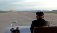 North Korean leader Kim Jong Un watches the launch of a Hwasong-12 missile in this undated photo released by North Korea's Korean Central News Agency (KCNA) on September 16, 2017. KCNA via REUTERS.
