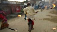 Nepali Madhesi protestors - a marginalised group in the southern plains - hold a torch rally in Janakpur as they protest against local elections. (Photo: AFP/PRAKASH MATHEMA).