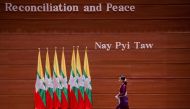Myanmar's State Counsellor Aung San Suu Kyi arrives to deliver a national address in Naypyidaw on September 19, 2017. AFP / Ye Aung Thu