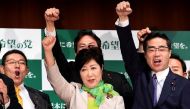 'PARTY OF HOPE' Tokyo Governor Yuriko Koike (C) poses with her party members during an inauguration press conference on her new political party, 'Party of Hope', in Tokyo on September 27, 2017. Toshifumi Kitamura/AFP.