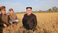 This undated picture released from North Korea's official Korean Central News Agency (KCNA) on September 30, 2017 shows North Korean leader Kim Jong-Un (C) visiting Farm No. 1116 under Korean People's Army (KPA) Unit 810 at an undisclosed location. AFP PH