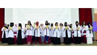 Students of QU-CPH take oath during the 11th annual White Coat Ceremony. 