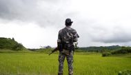 A Myanmar soldier stands near Maungdaw, north of Rakhine state, Myanmar September 27, 2017. REUTERS/Soe Zeya Tun.