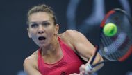Simona Halep of Romania in action against Jelena Ostapenko of Latvia. REUTERS/Jason Lee
