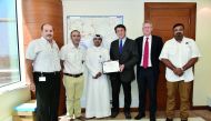 The Ashghal team celebrating the achievement.