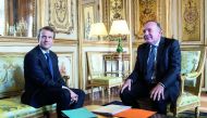 French President Emmanuel Macron (left) attends a meeting with French employer’s body MEDEF union leader Pierre Gattaz at the Elysee Palace in Paris, France, yesterday