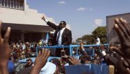 Malawi's President Peter Mutharika of the Democratic Progressive Party waves to supporters after he was sworn in in Blantyre May 31, 2014. Reuters/Eldson Chagara


