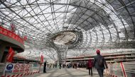 Journalists visit the terminal hall of new Daxing Airport, during a government trip, under construction on the outskirts of Beijing, China October 16, 2017. REUTERS/Jason Lee
