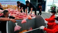 A file photo of the Thai officials disposing of bags of Methamphetamine pills.Reuters.