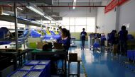 Batteries for electric vehicles are manufactured at a factory in Dongguan, China September 20, 2017. Picture taken September 20, 2017. Reuters/Bobby Yip