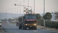 Turkish Army's armoured vehicles are deployed on the border line in the Turkish border district of Reyhanli near Syria's Idlib, within the reconnaissance activities in Idlib as part of an international agreement to establish de-escalation zones, in Hatay,