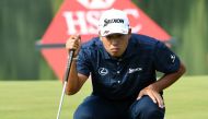 Hideki Matsuyama of Japan lines up a putt during the first round at the WGC-HSBC Champions at the Sheshan International golf club in Shanghai on October 26, 2017. / AFP / GOH CHAI HIN