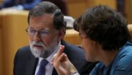 Spain's Prime Minister Mariano Rajoy (L) listens to Deputy Prime Minister Soraya Saenz de Santamaria during a debate at the upper house Senate in Madrid, Spain, October 27, 2017. REUTERS/Susana Vera