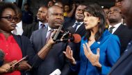 US Ambassador to the United Nations Nikki Haley and President of Congo's electoral commission (CENI) Corneille Nangaa (C) addresses the media at the CENI headquarters in Gombe, Kinshasa, Democratic Republic of Congo, October 27, 2017. REUTERS/Robert Carru