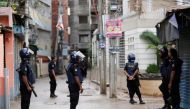 A file photo of security personnel blocking a road near the site of a police operation on militants on the outskirts Dhaka, Bangladesh, July 26, 2016. Reuters/Mohammad Ponir Hossain.