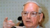 A file photo of Ninian Stephen, a judge and former governor-general of Australia, gestures during a news conferece in Phnom Penh, Cambodia, November 17, 1998. REUTERS/Stringer.