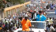 Kenyan opposition leader Raila Odinga of the National Super Alliance (NASA) coalition greets his supporters in Nairobi, Kenya October 29, 2017. REUTERS/Thomas Mukoya