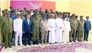 Minister of State for Defence Affairs H E Dr Khalid bin Mohammed Al Attiyah, Chief of Staff of the Qatari Armed Forces Major General (Pilot) H E Ghanem bin Shaheen Al Ghanem, and other senior officials and faculty members with the graduates.