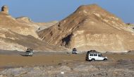 Four-wheel drive cars cross the Egyptian western desert and the Bahariya Oasis southwest of Cairo in this picture taken on May 15, 2015. (Reuters / Amr Abdallah Dalsh) 