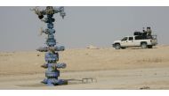 (File Photo) An Iraqi army vehicle secures the Akkas gas field in the western desert of Iraq October 19, 2010. (ALI AL-MASHHADANI/Reuters)