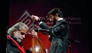 Unesco Artist for Peace, Marcel Khalife (left), will perform tonight at Qatar Philharmonic Orchestra’s concert under the baton of conductor Lubnan Baalbaki (right).