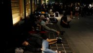 People queue overnight for the iPhone X launch outside the Apple store in Singapore November 3, 2017. REUTERS/Edgar Su