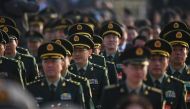China's military, the world's largest, is technically the armed force of the ruling Communist Party rather than the state. / AFP.