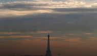 A small-particle haze hangs above the Eiffel Tower that is seen on the horizon from Suresnes near Paris, France, December 8, 2016