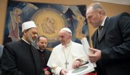 Pope Francis exchanges gifts with Grand Imam of al-Azhar Ahmed al-Tayeb during a private audience at the Vatican November 7, 2017. Osservatore Romano/ Reuters 