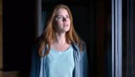 A still of actress Amy Adams from the movie Arrival.