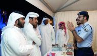 Officials during the celebrations to mark Qatari Human Rights Day. 